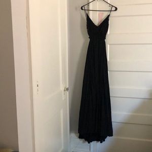 Floor length black dress, beautiful open back.